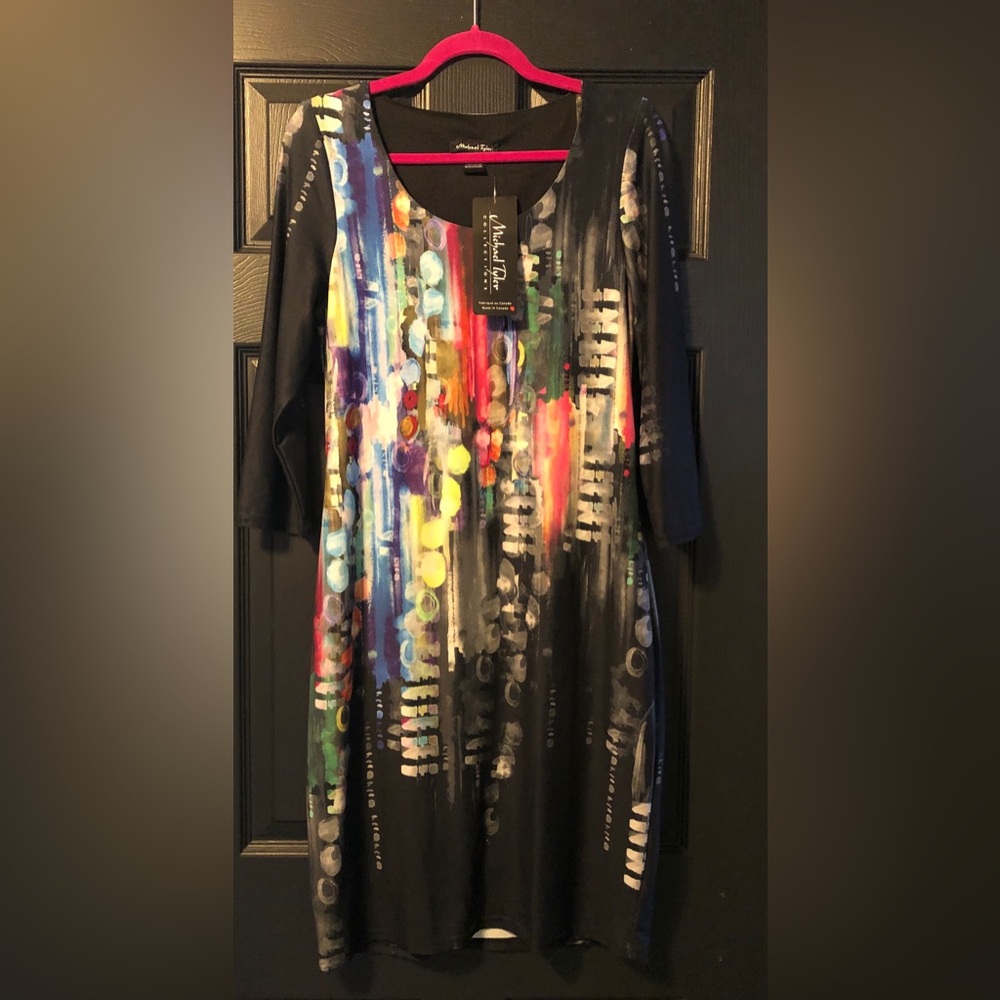 Abstract Multicolor Midi Dress with Black Sleeves
Michael Tyler
Size M
BNWT